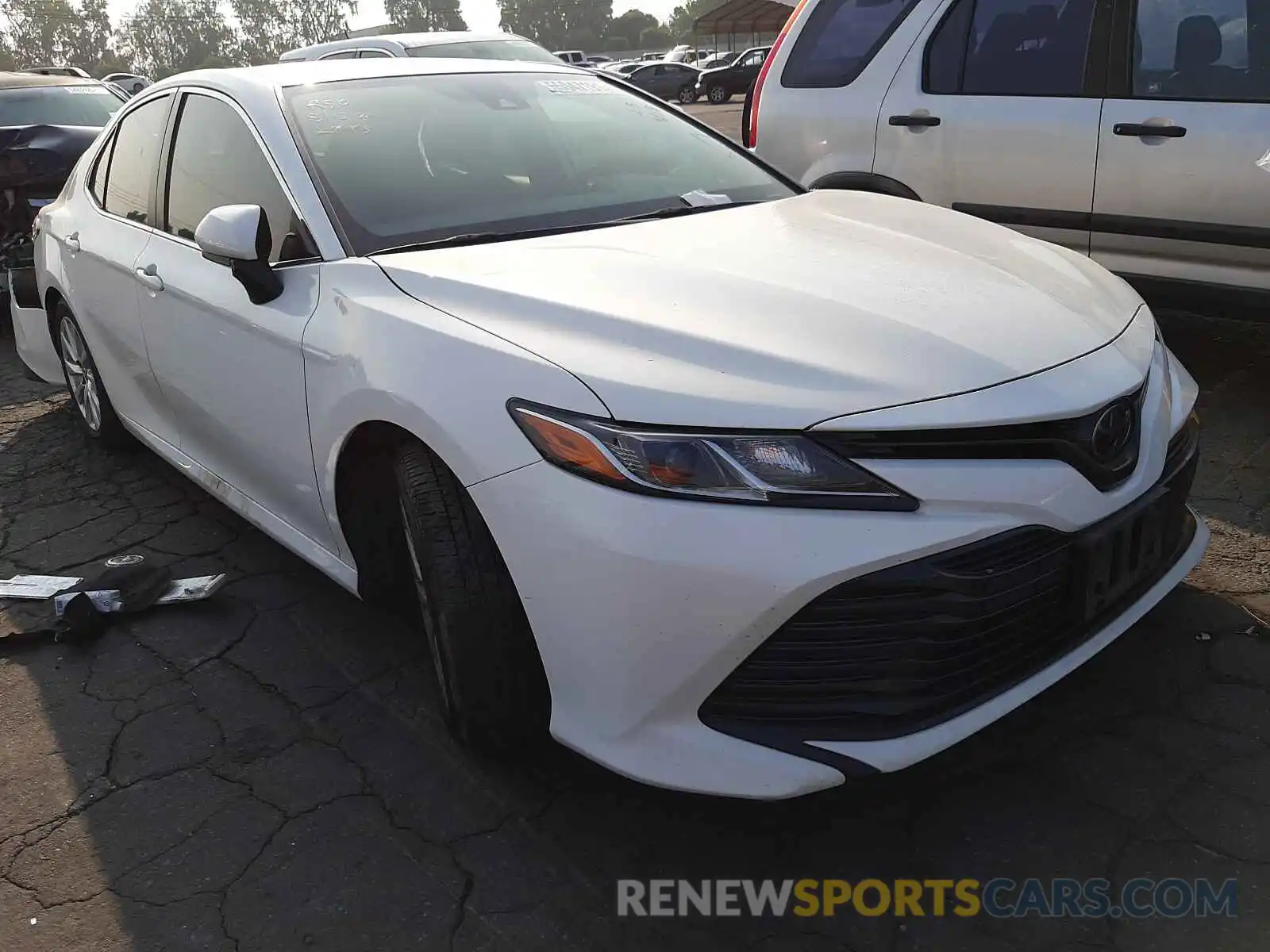 1 Photograph of a damaged car JTNB11HK0K3086649 TOYOTA CAMRY 2019