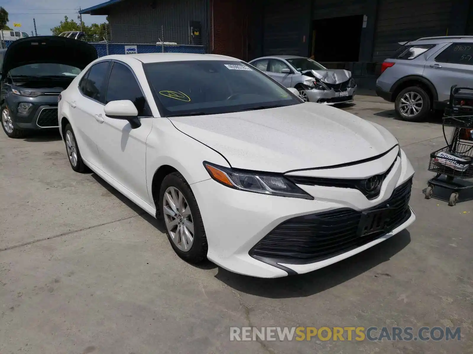 1 Photograph of a damaged car JTNB11HK1K3084974 TOYOTA CAMRY 2019