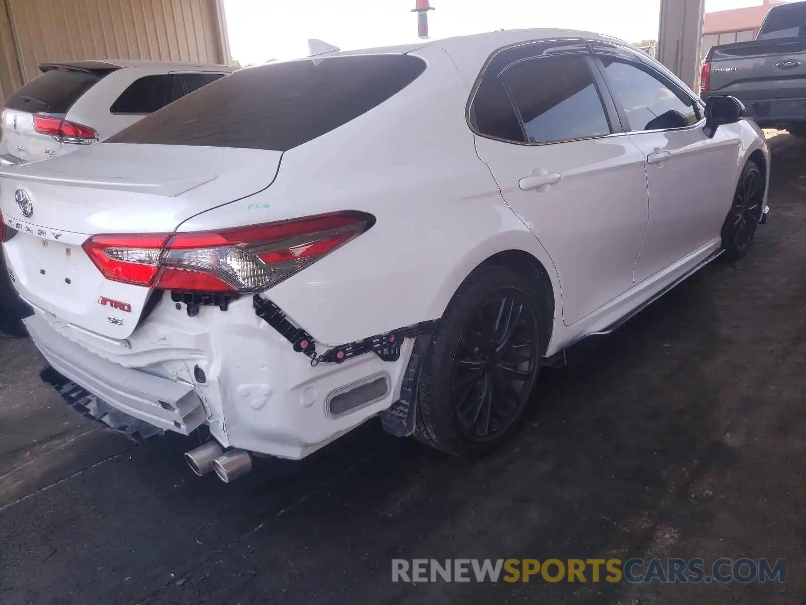 4 Photograph of a damaged car JTNB11HK1K3086806 TOYOTA CAMRY 2019