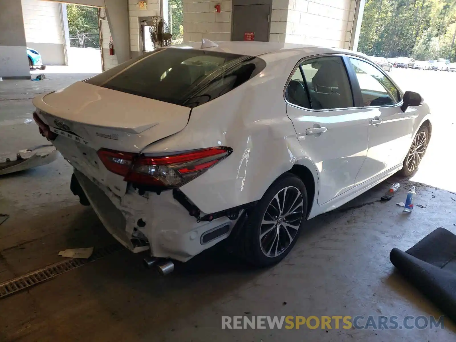 4 Photograph of a damaged car JTNB11HK2K3080447 TOYOTA CAMRY 2019