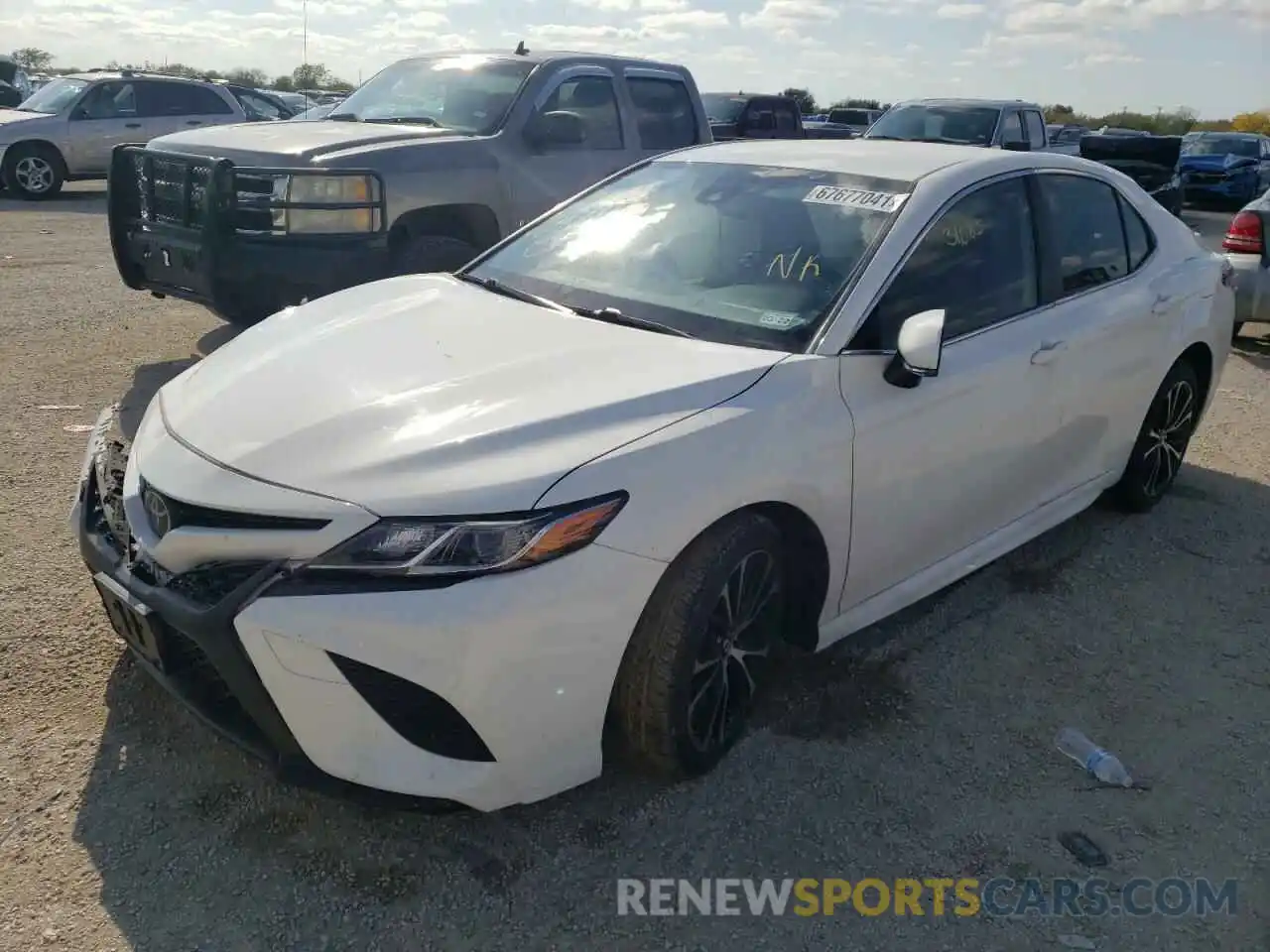 2 Photograph of a damaged car JTNB11HK2K3081372 TOYOTA CAMRY 2019