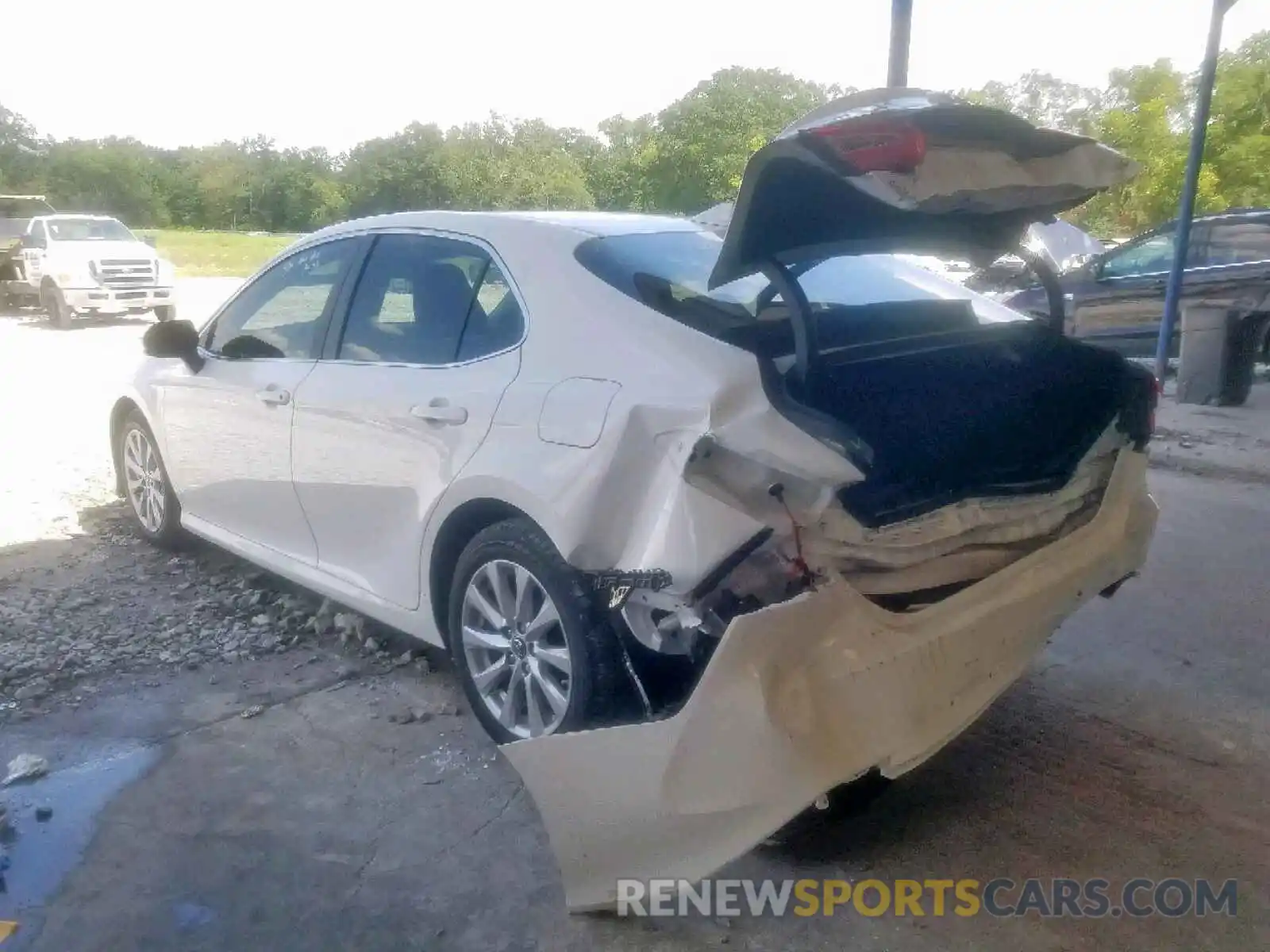 3 Photograph of a damaged car JTNB11HK5K3086260 TOYOTA CAMRY 2019