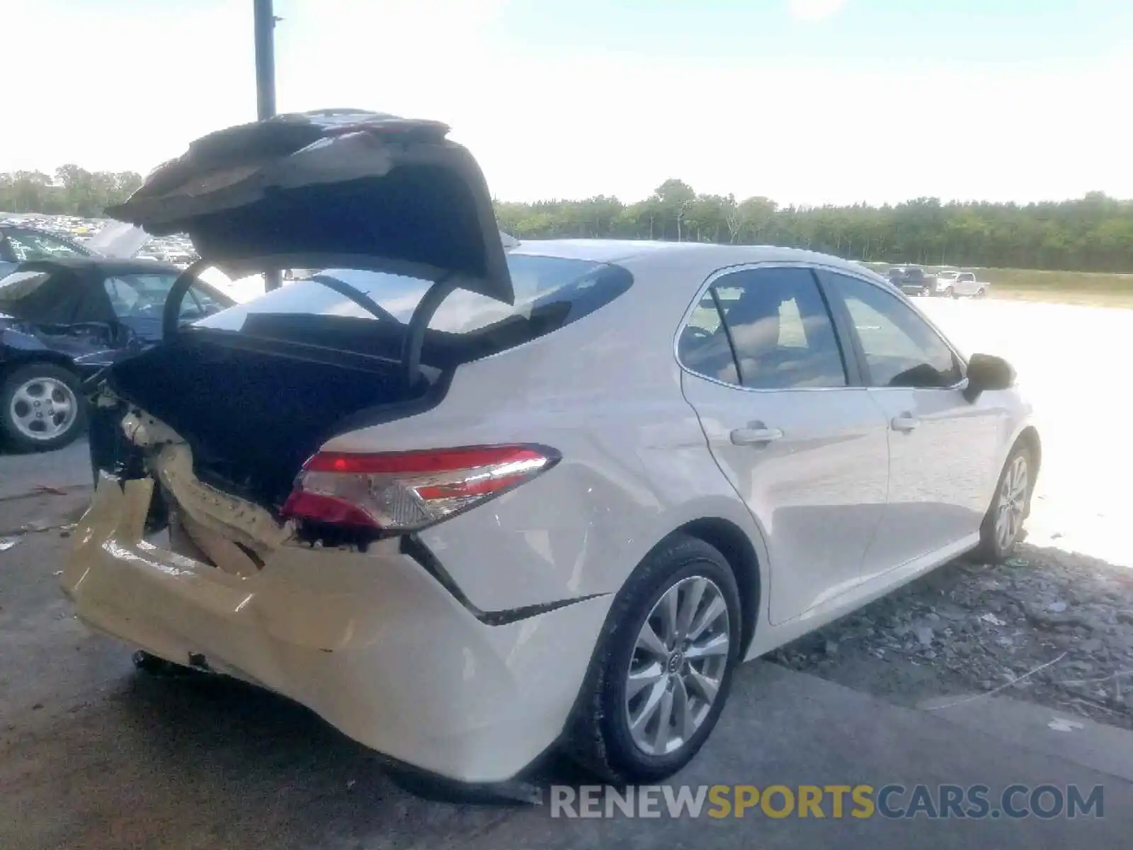 4 Photograph of a damaged car JTNB11HK5K3086260 TOYOTA CAMRY 2019