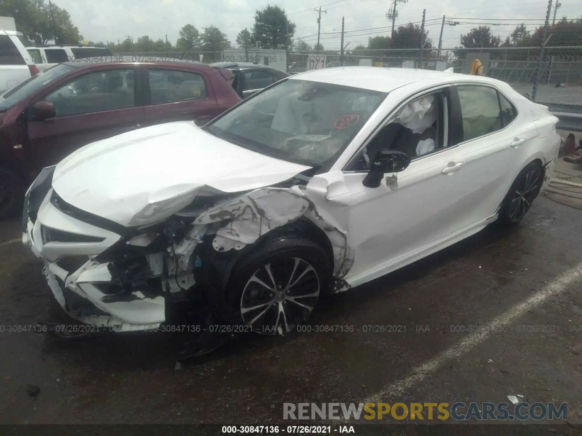 2 Photograph of a damaged car JTNB11HK6K3082413 TOYOTA CAMRY 2019