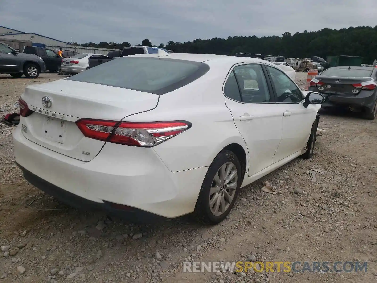 4 Photograph of a damaged car 4T1C11AK0LU869965 TOYOTA CAMRY 2020