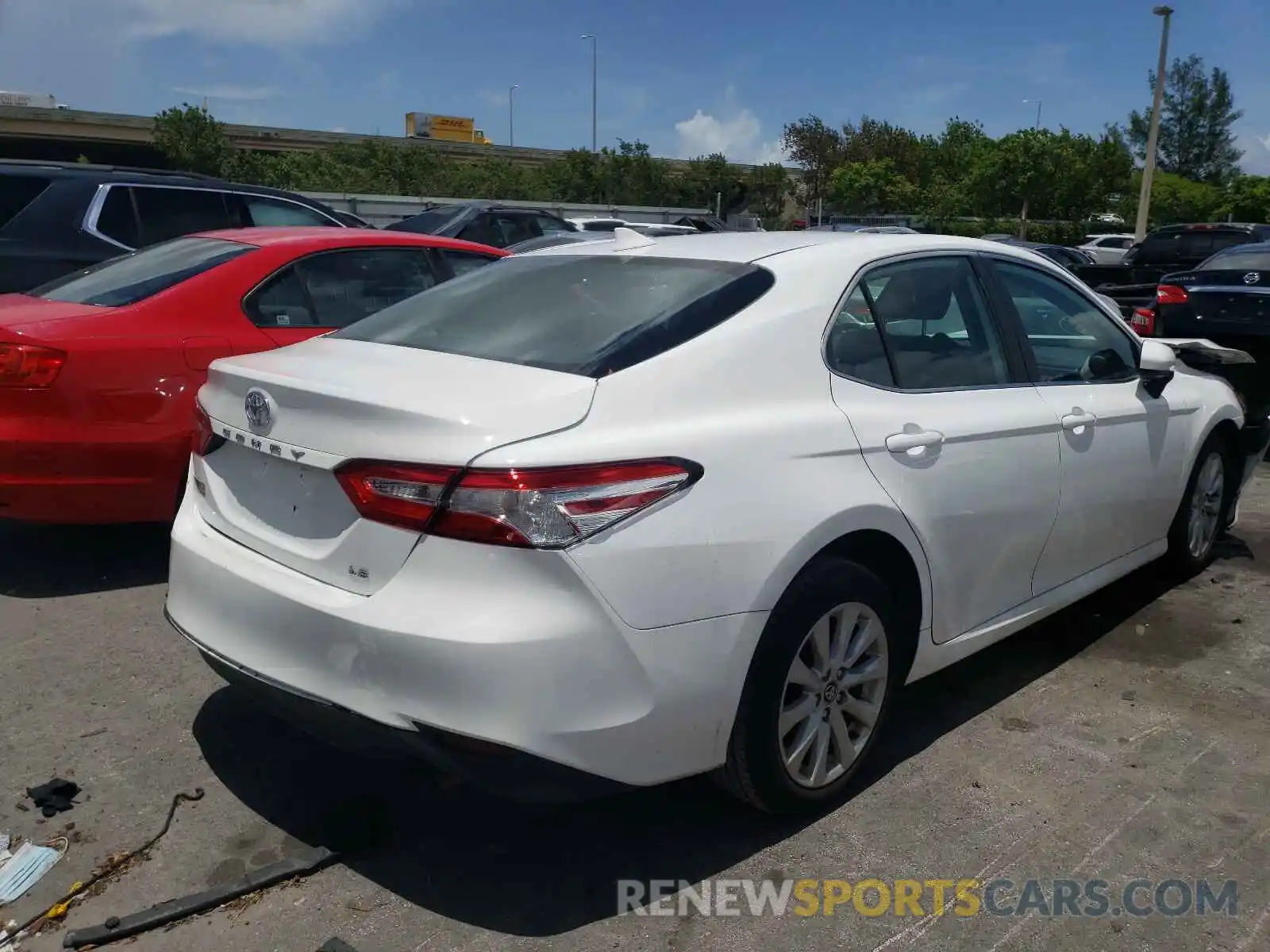 4 Photograph of a damaged car 4T1C11AK0LU871280 TOYOTA CAMRY 2020