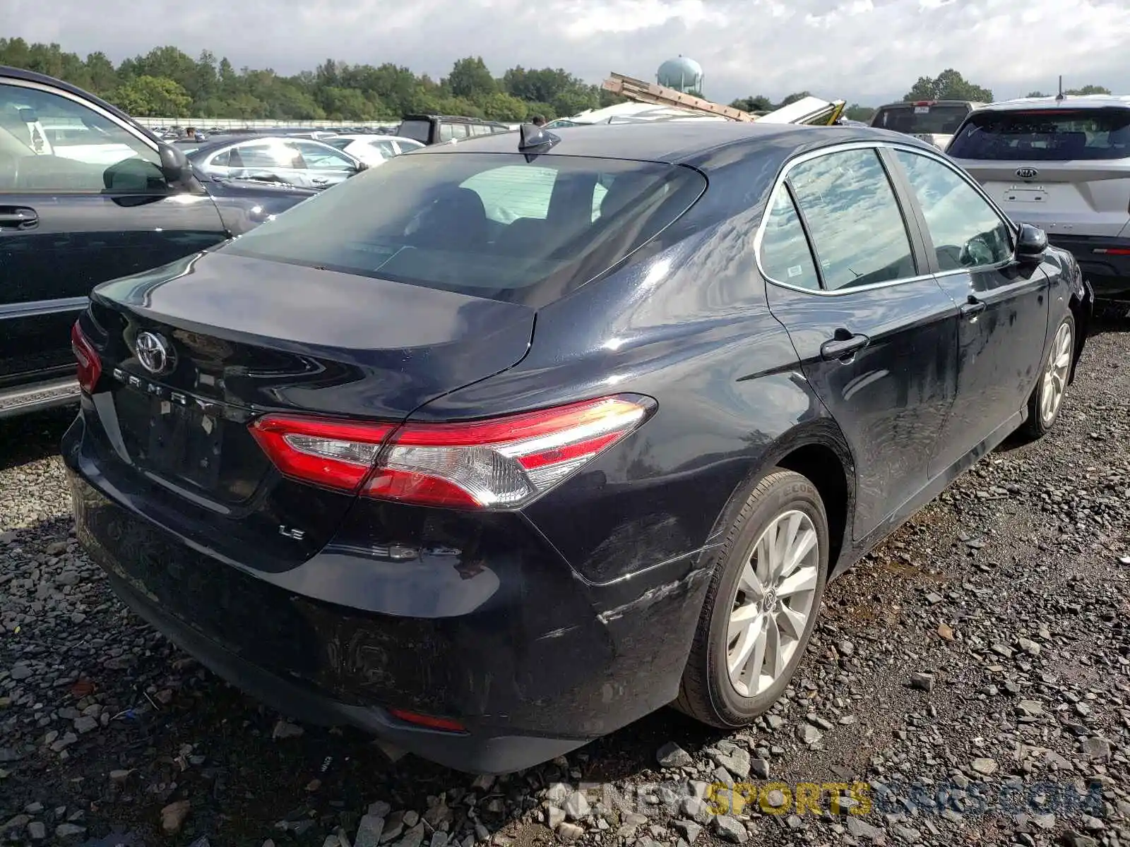 4 Photograph of a damaged car 4T1C11AK3LU358475 TOYOTA CAMRY 2020