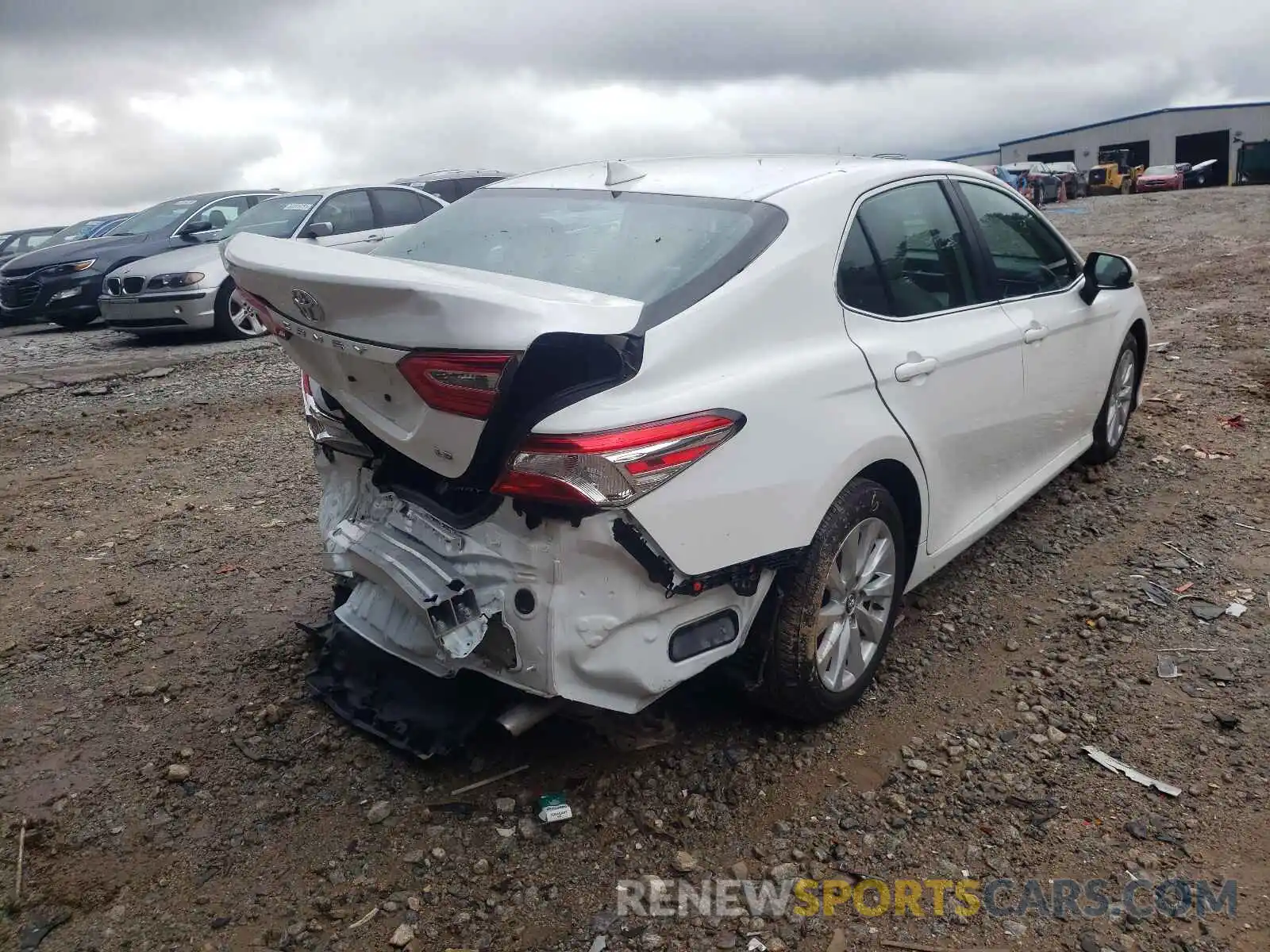 4 Photograph of a damaged car 4T1C11AK3LU879843 TOYOTA CAMRY 2020