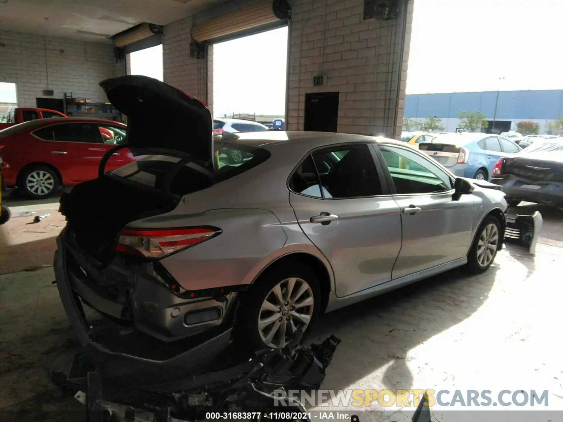 4 Photograph of a damaged car 4T1C11AK5LU955871 TOYOTA CAMRY 2020