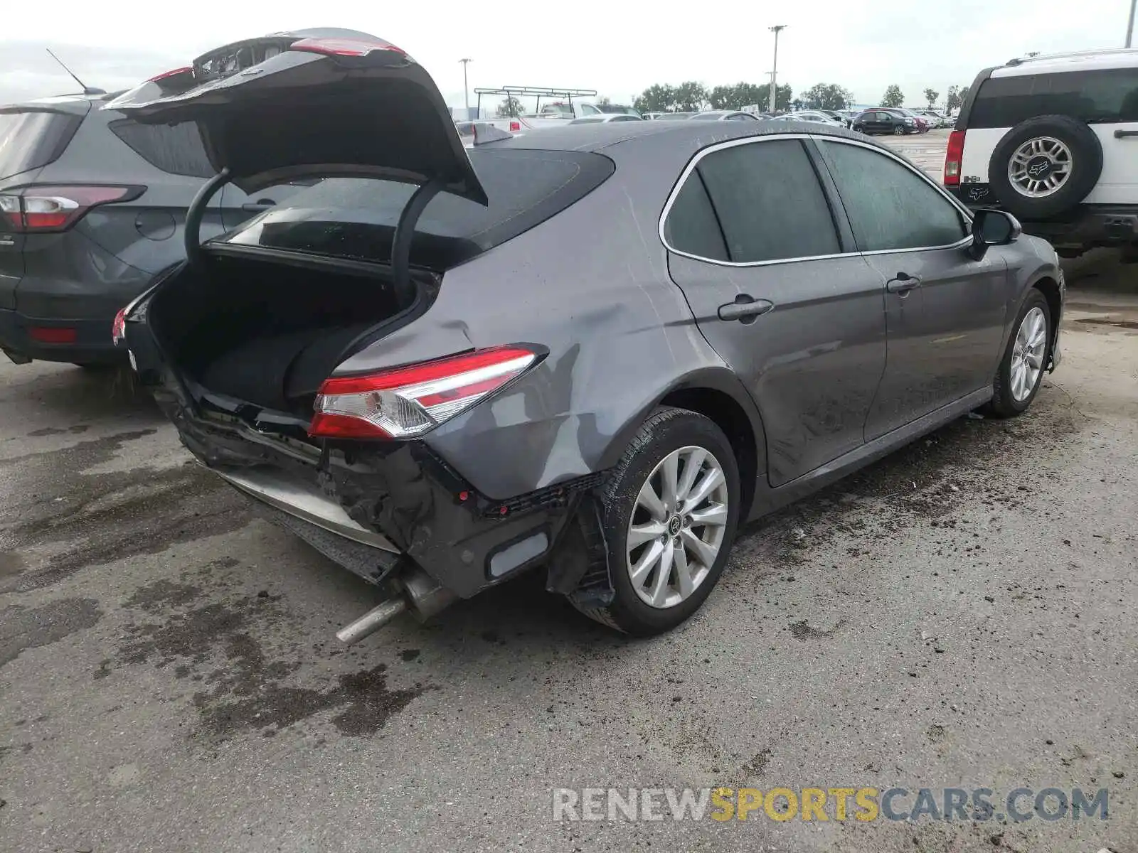 4 Photograph of a damaged car 4T1C11AK6LU999071 TOYOTA CAMRY 2020