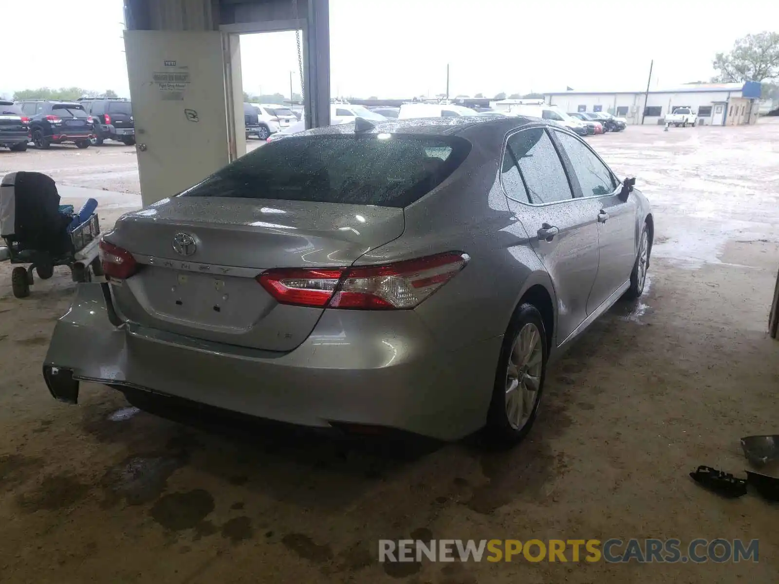 4 Photograph of a damaged car 4T1C11AK7LU986703 TOYOTA CAMRY 2020