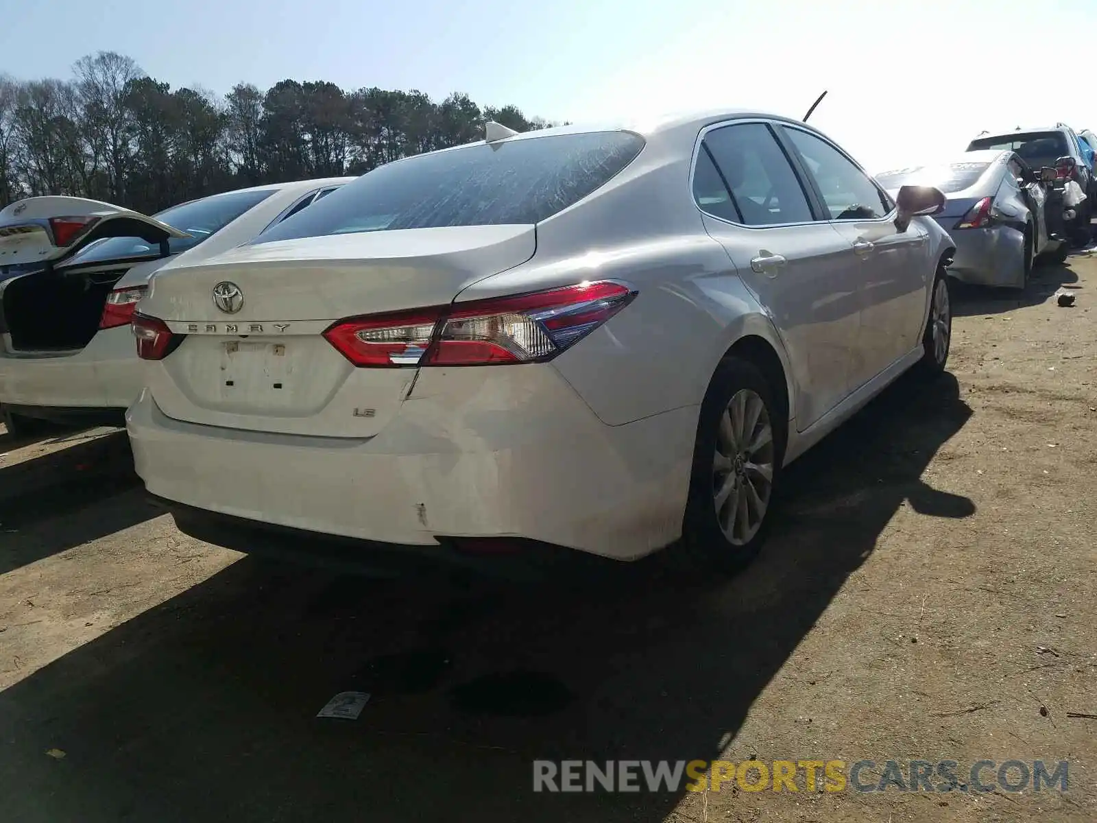 4 Photograph of a damaged car 4T1C11AK8LU857529 TOYOTA CAMRY 2020