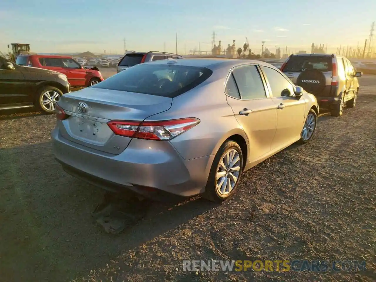 4 Photograph of a damaged car 4T1C11AKXLU313274 TOYOTA CAMRY 2020