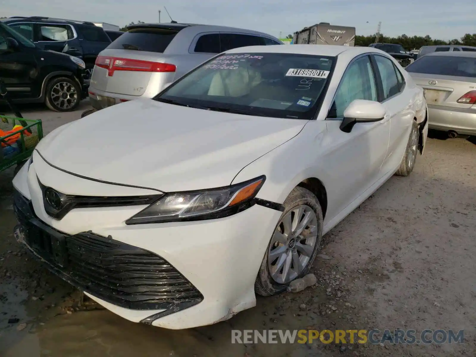 2 Photograph of a damaged car 4T1C11AKXLU346873 TOYOTA CAMRY 2020