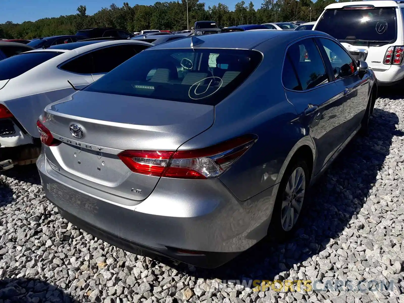 4 Photograph of a damaged car 4T1C11AKXLU949709 TOYOTA CAMRY 2020