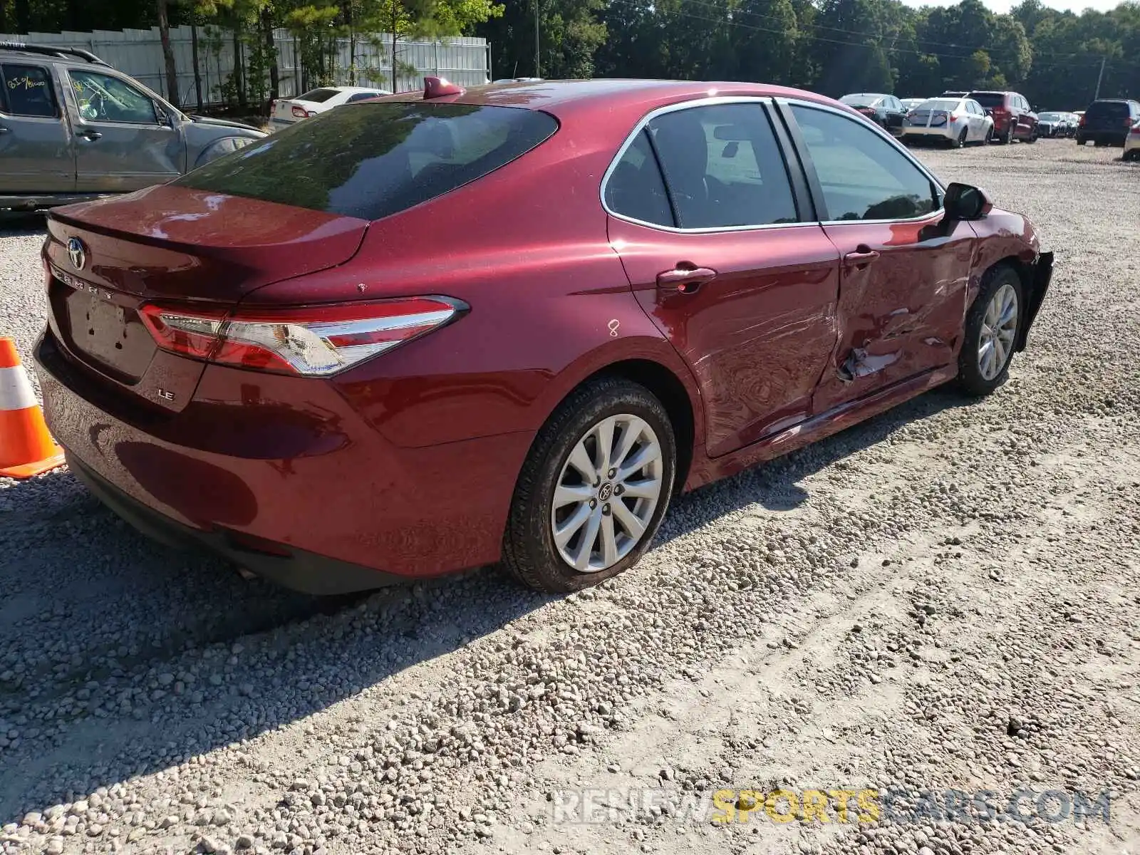 4 Photograph of a damaged car 4T1C11AKXLU989370 TOYOTA CAMRY 2020