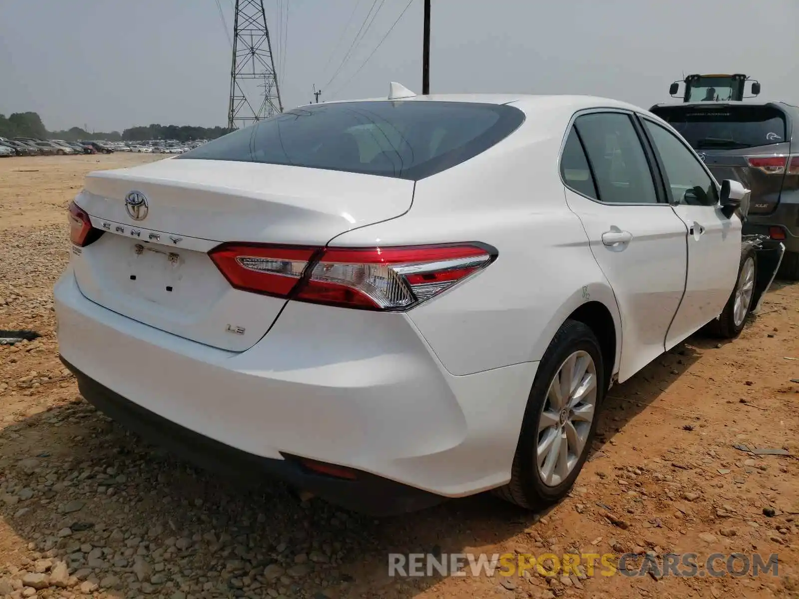 4 Photograph of a damaged car 4T1C11AKXLU999560 TOYOTA CAMRY 2020