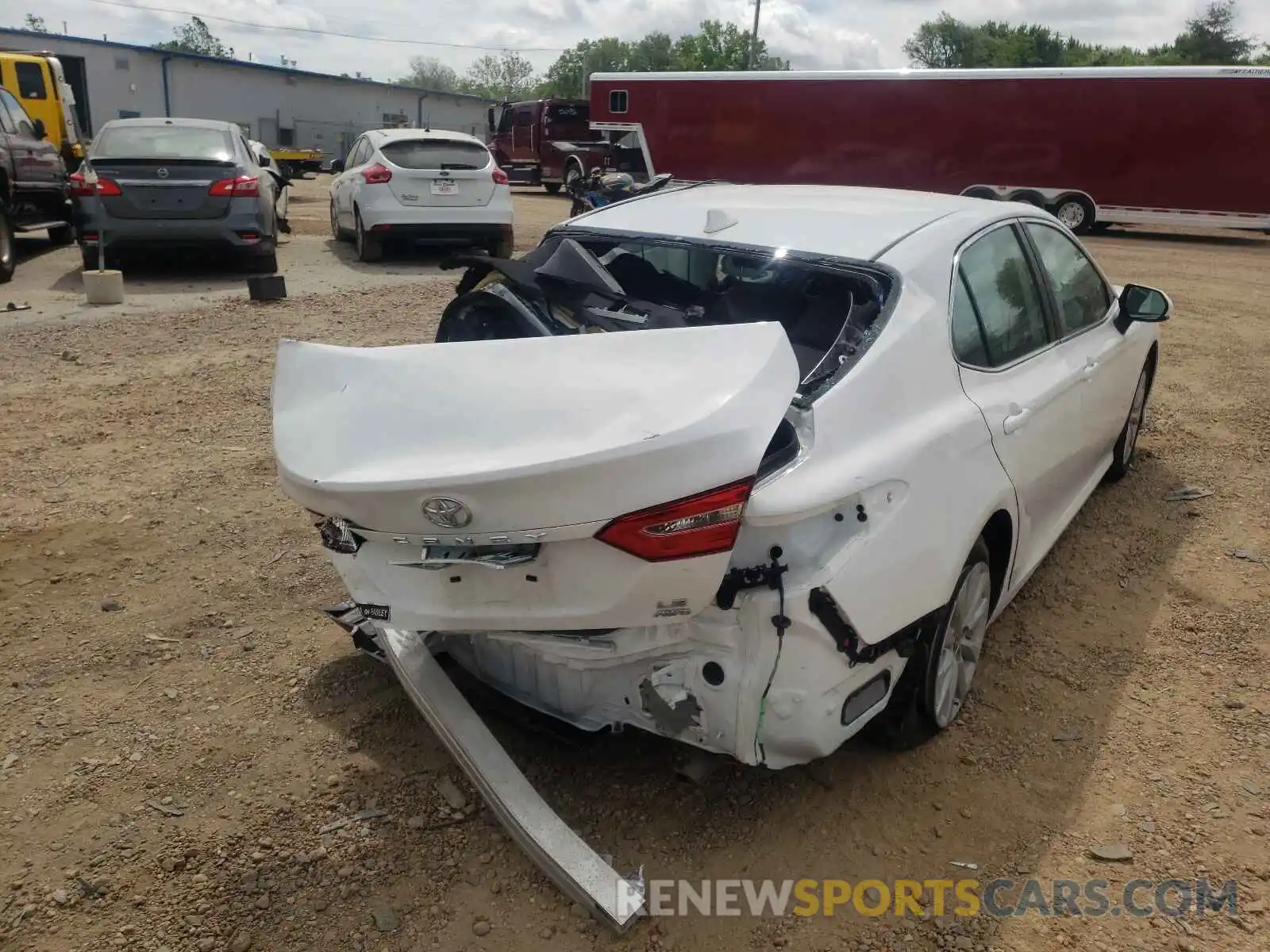 4 Photograph of a damaged car 4T1C11BK1LU006994 TOYOTA CAMRY 2020