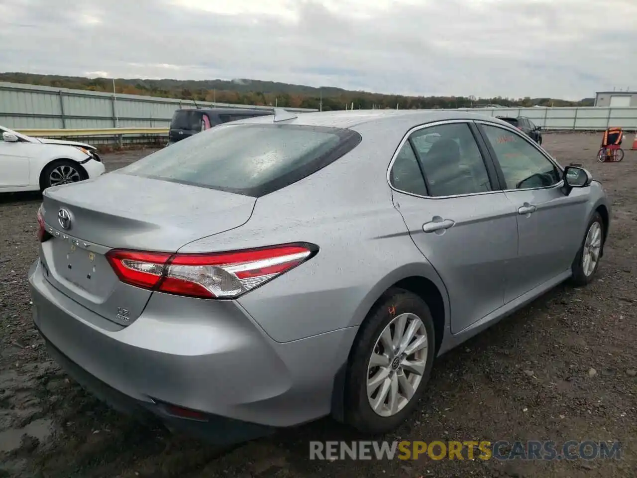 4 Photograph of a damaged car 4T1C11BK4LU010313 TOYOTA CAMRY 2020