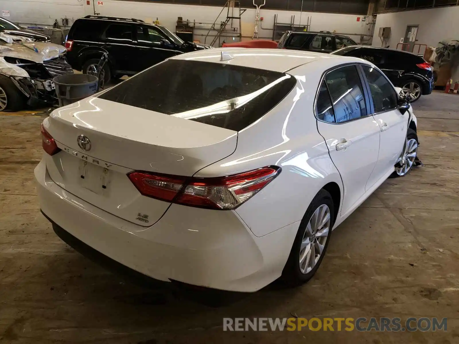 4 Photograph of a damaged car 4T1C11BK4LU013535 TOYOTA CAMRY 2020