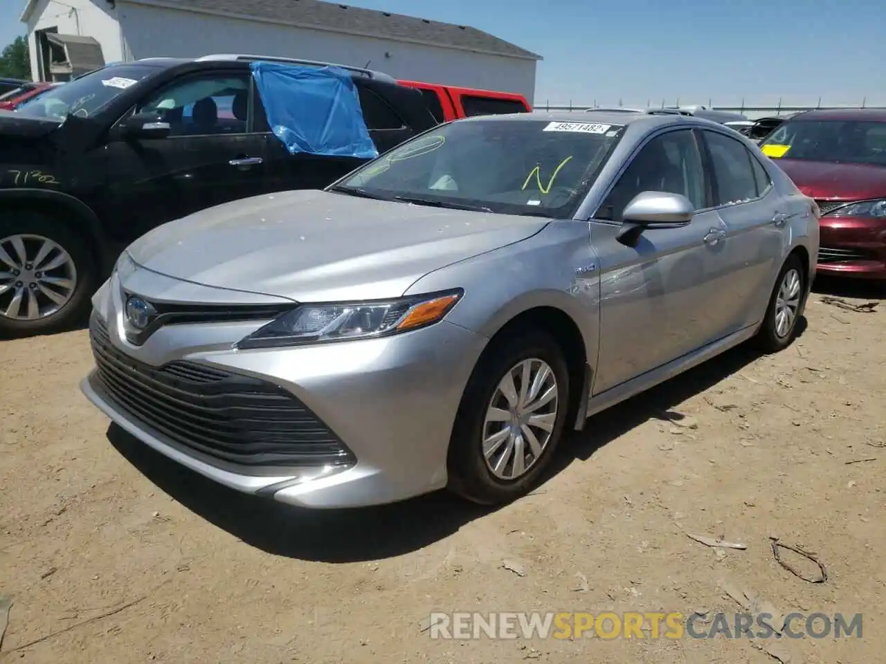 2 Photograph of a damaged car 4T1E31AKXLU521965 TOYOTA CAMRY 2020