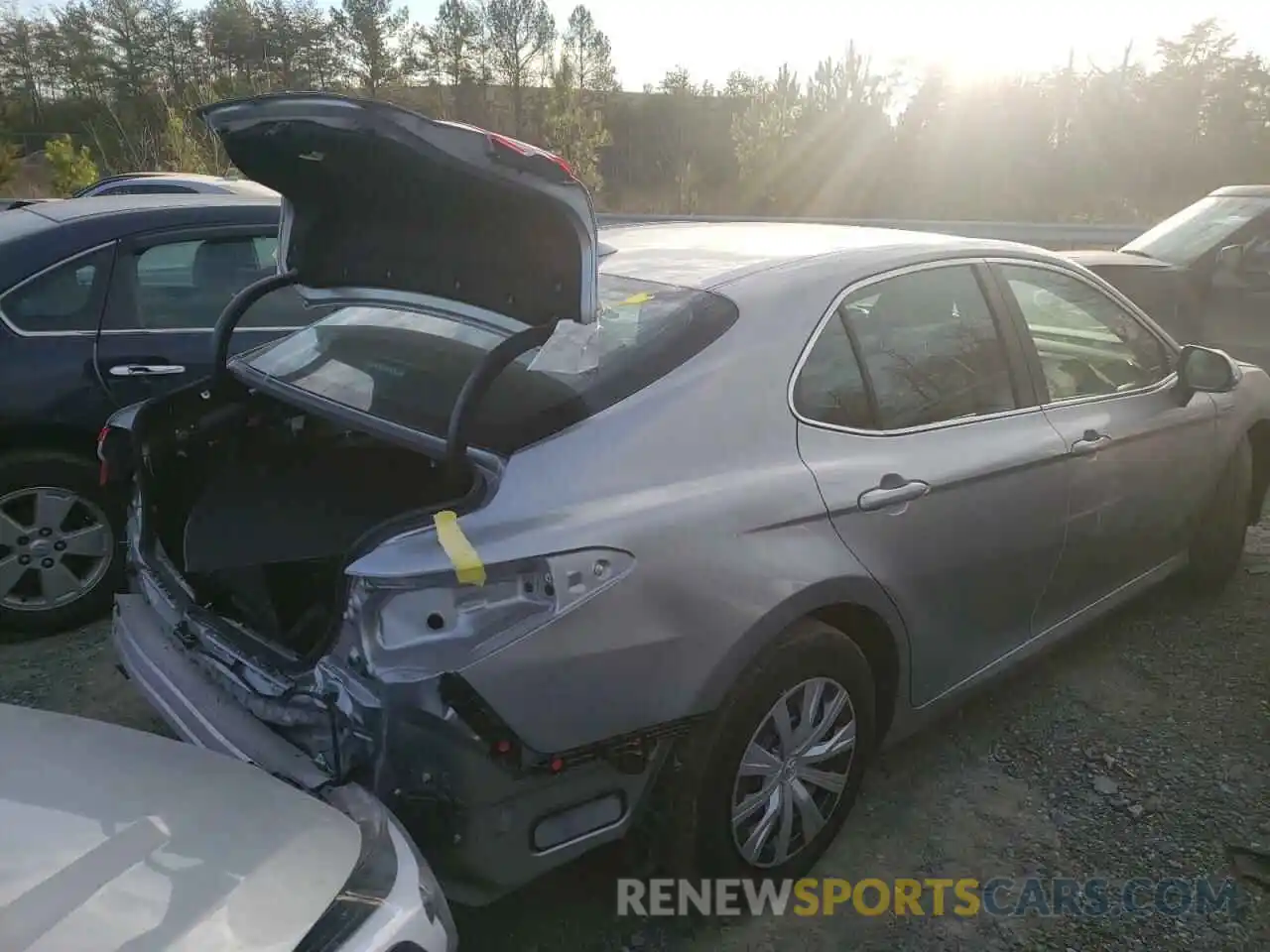 4 Photograph of a damaged car 4T1E31AKXLU525577 TOYOTA CAMRY 2020