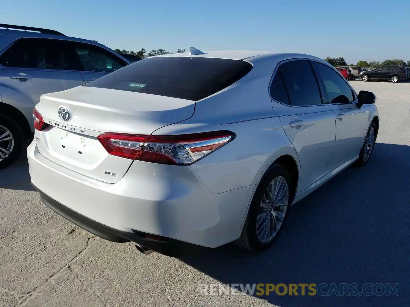 4 Photograph of a damaged car 4T1F11AK1LU311233 TOYOTA CAMRY 2020