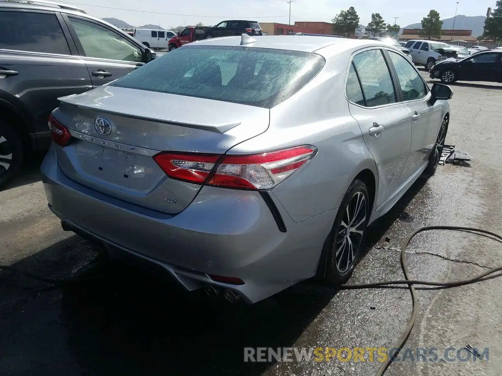 4 Photograph of a damaged car 4T1G11AK0LU314046 TOYOTA CAMRY 2020