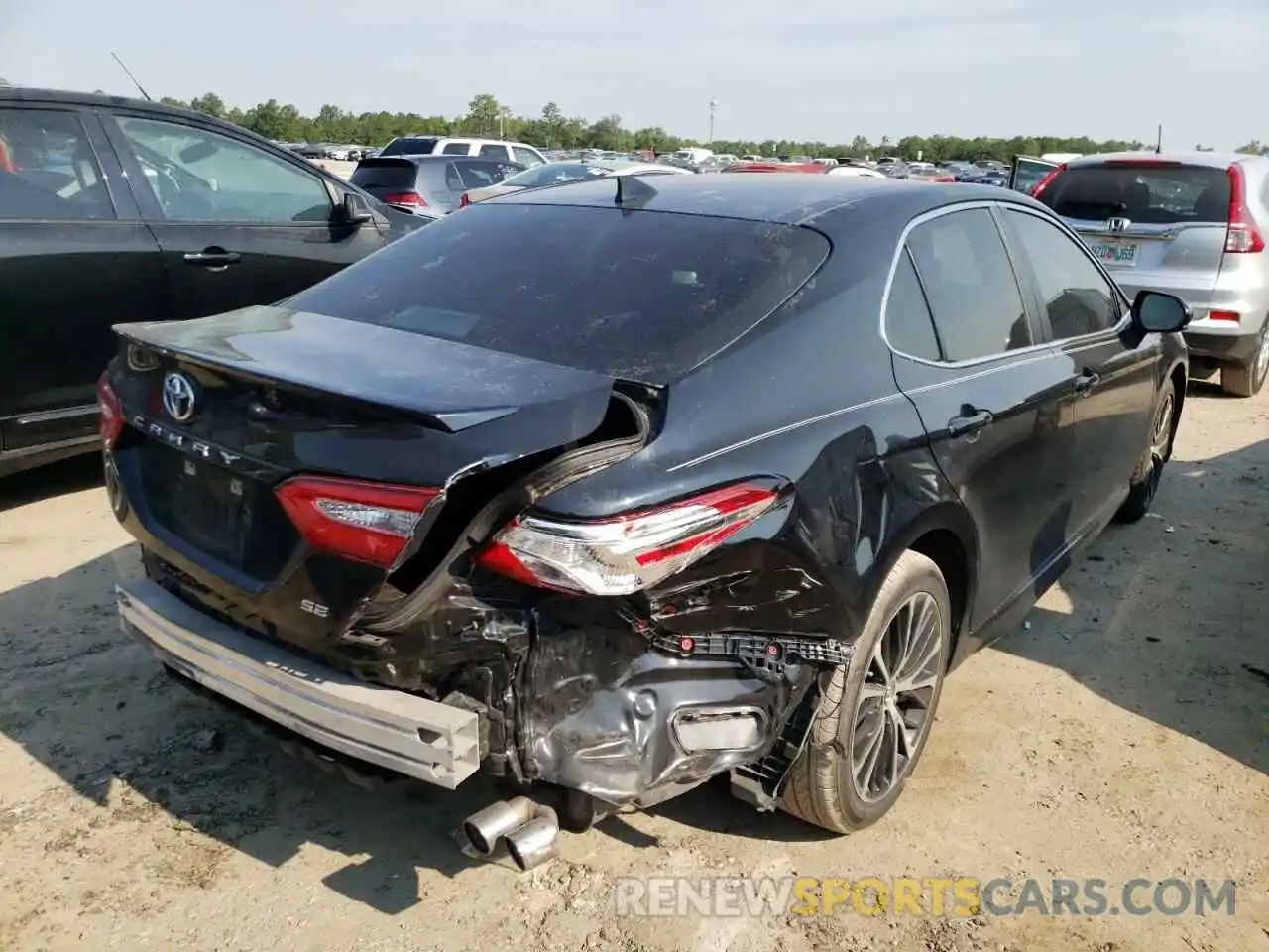 4 Photograph of a damaged car 4T1G11AK0LU937831 TOYOTA CAMRY 2020