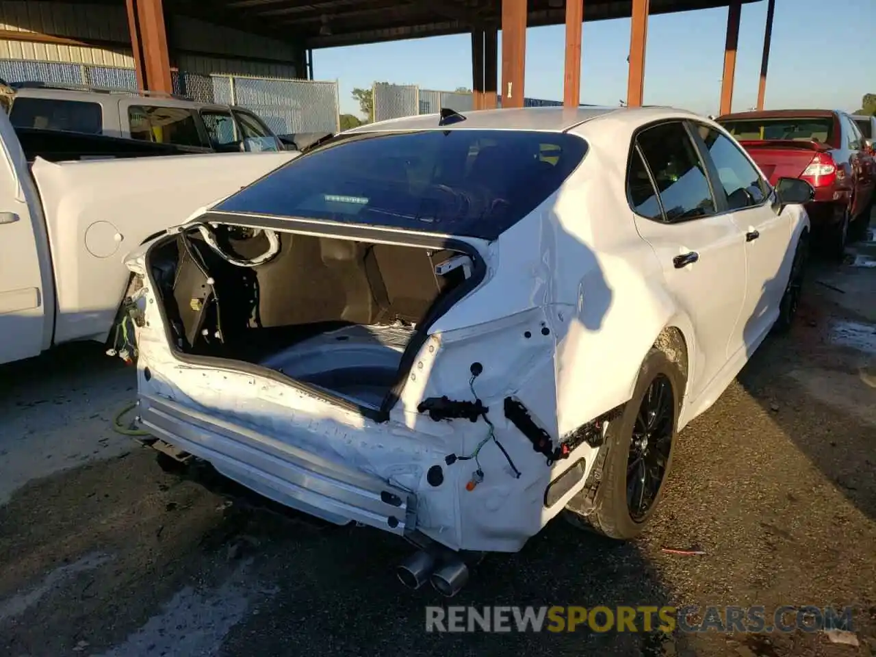 4 Photograph of a damaged car 4T1G11AK1LU346519 TOYOTA CAMRY 2020