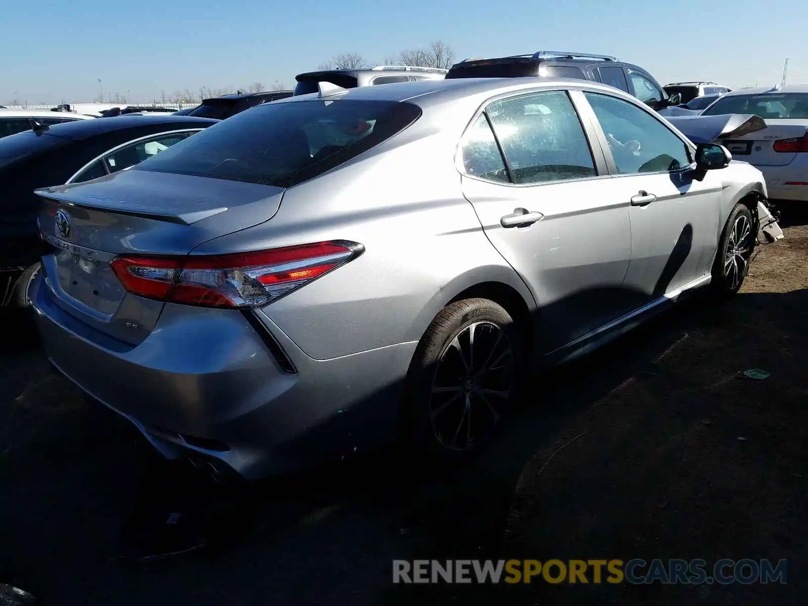 4 Photograph of a damaged car 4T1G11AK1LU912873 TOYOTA CAMRY 2020