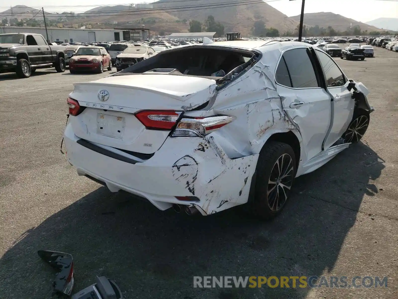 4 Photograph of a damaged car 4T1G11AK1LU920875 TOYOTA CAMRY 2020