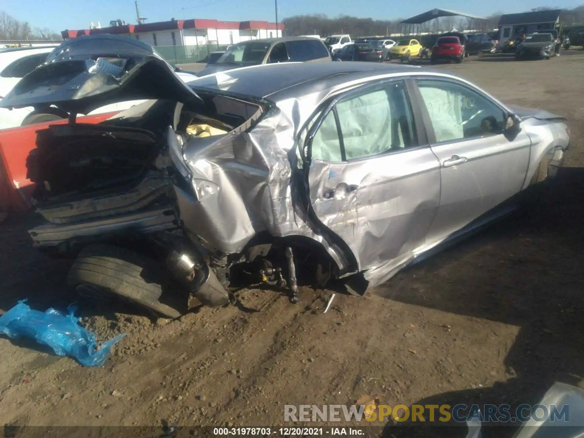 4 Photograph of a damaged car 4T1G11AK1LU970837 TOYOTA CAMRY 2020