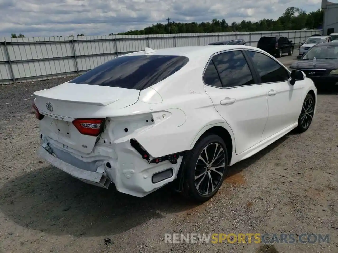 4 Photograph of a damaged car 4T1G11AK1LU998752 TOYOTA CAMRY 2020