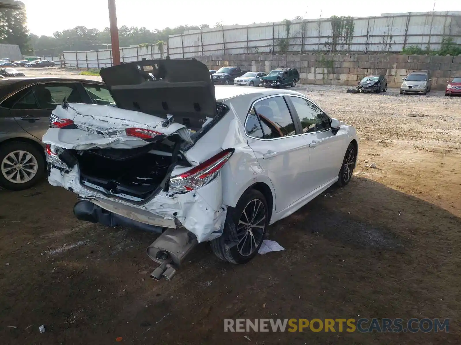 4 Photograph of a damaged car 4T1G11AK2LU359201 TOYOTA CAMRY 2020