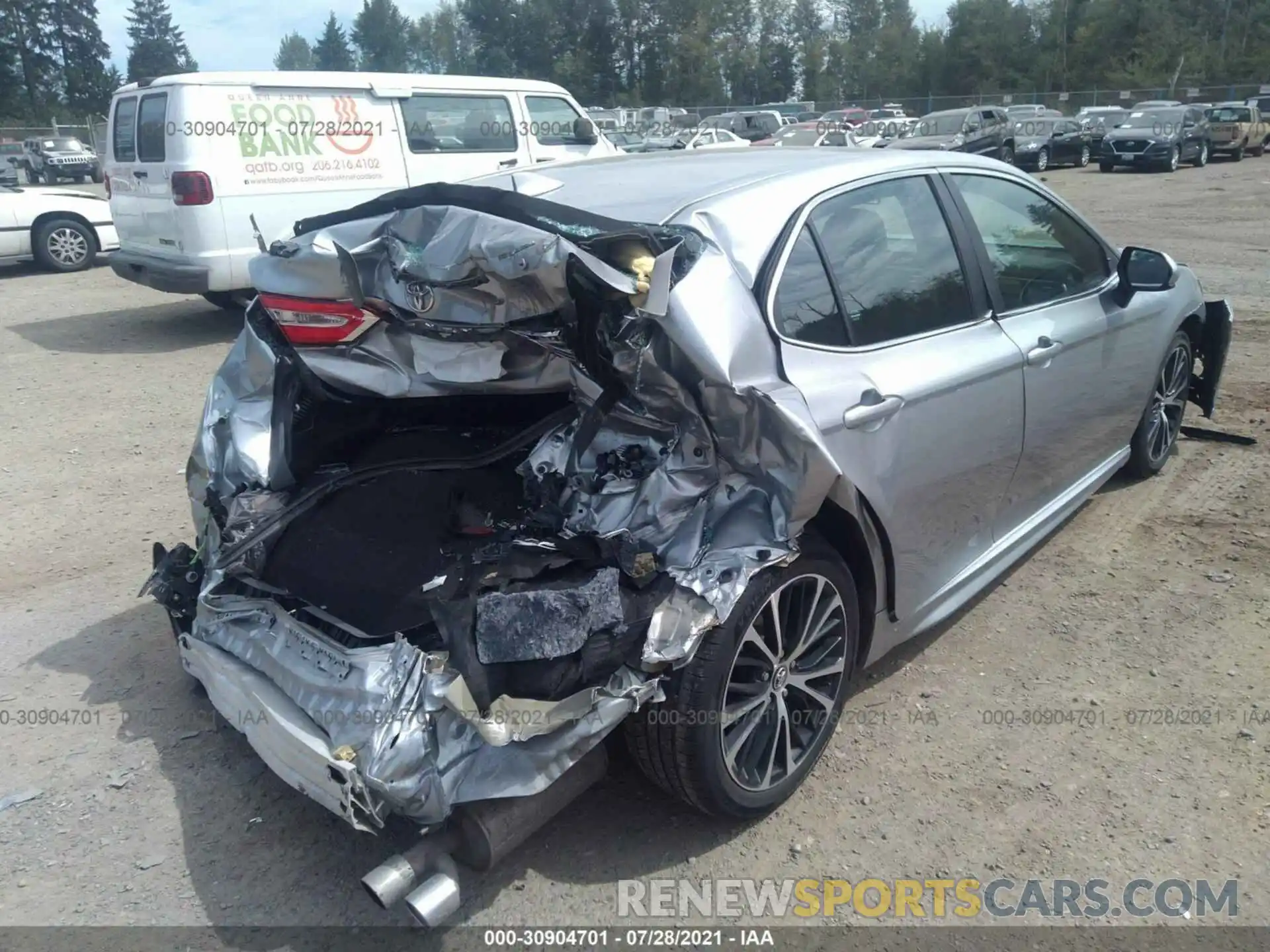 4 Photograph of a damaged car 4T1G11AK2LU869709 TOYOTA CAMRY 2020