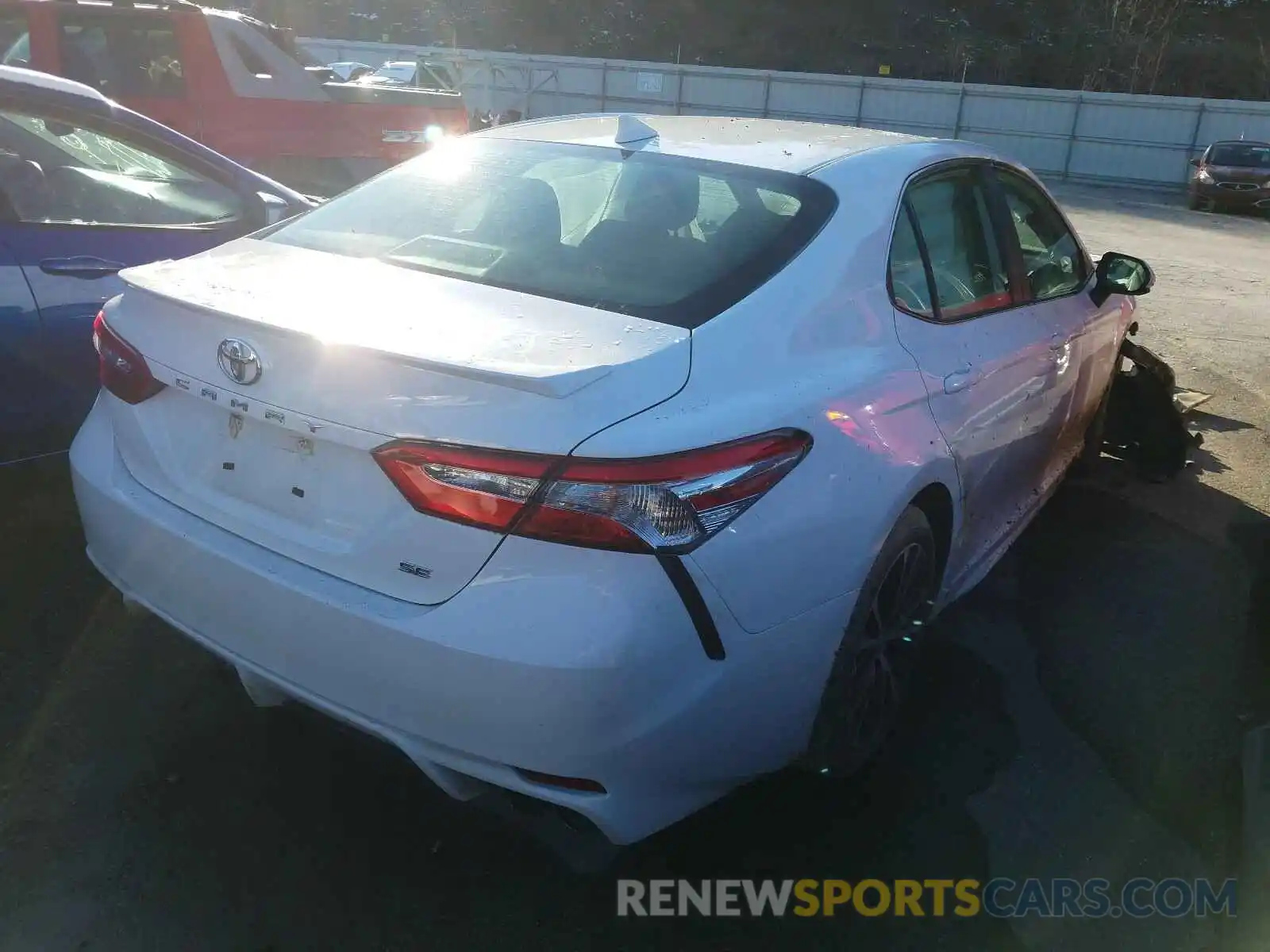 4 Photograph of a damaged car 4T1G11AK2LU923574 TOYOTA CAMRY 2020