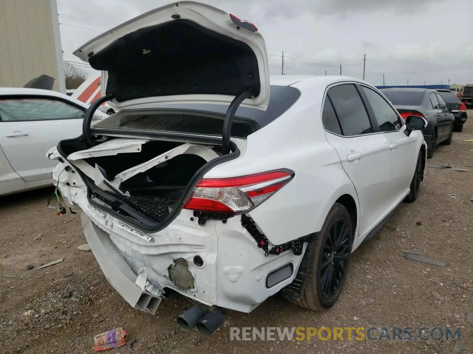 4 Photograph of a damaged car 4T1G11AK2LU986223 TOYOTA CAMRY 2020