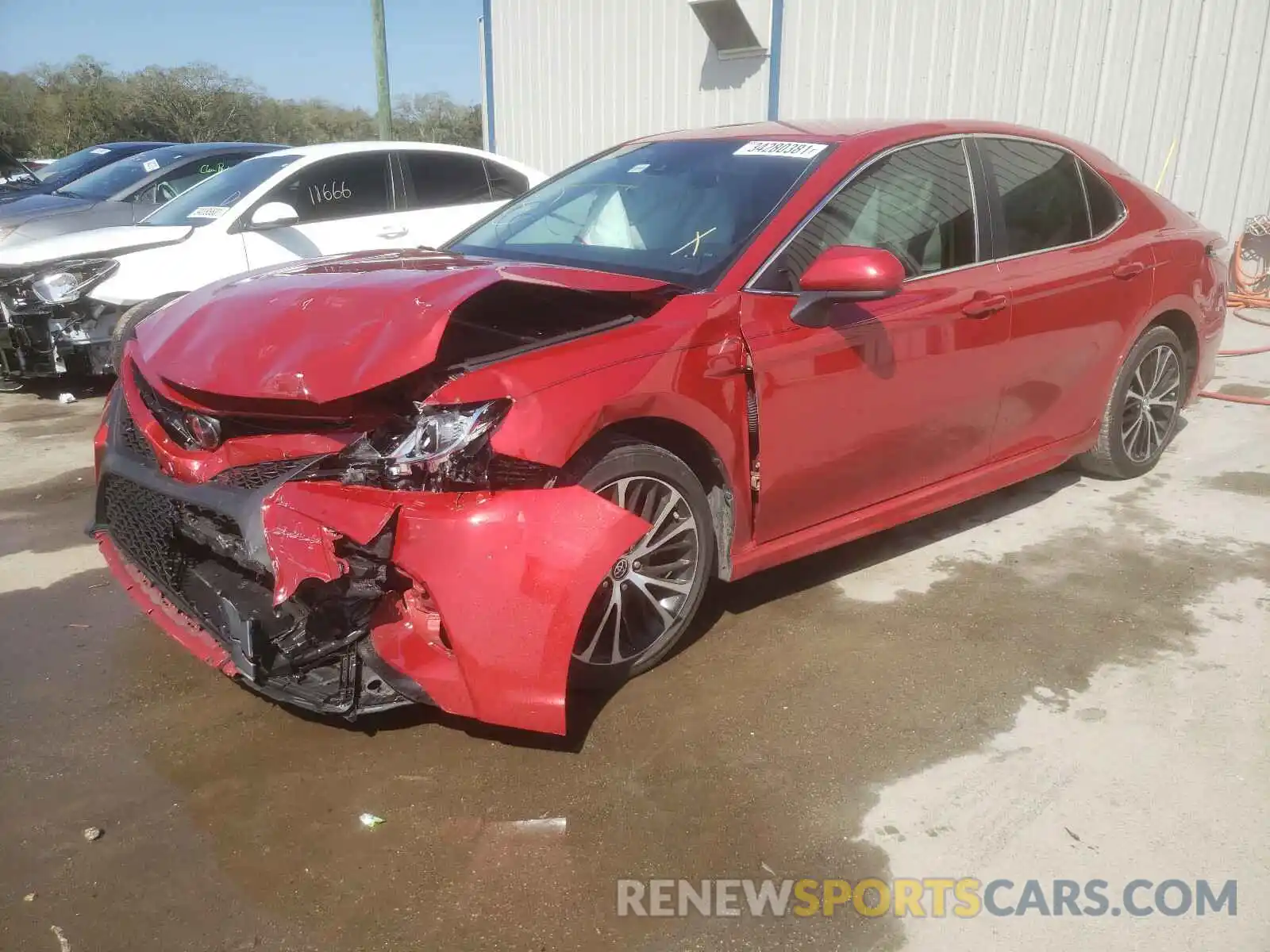 2 Photograph of a damaged car 4T1G11AK3LU309536 TOYOTA CAMRY 2020