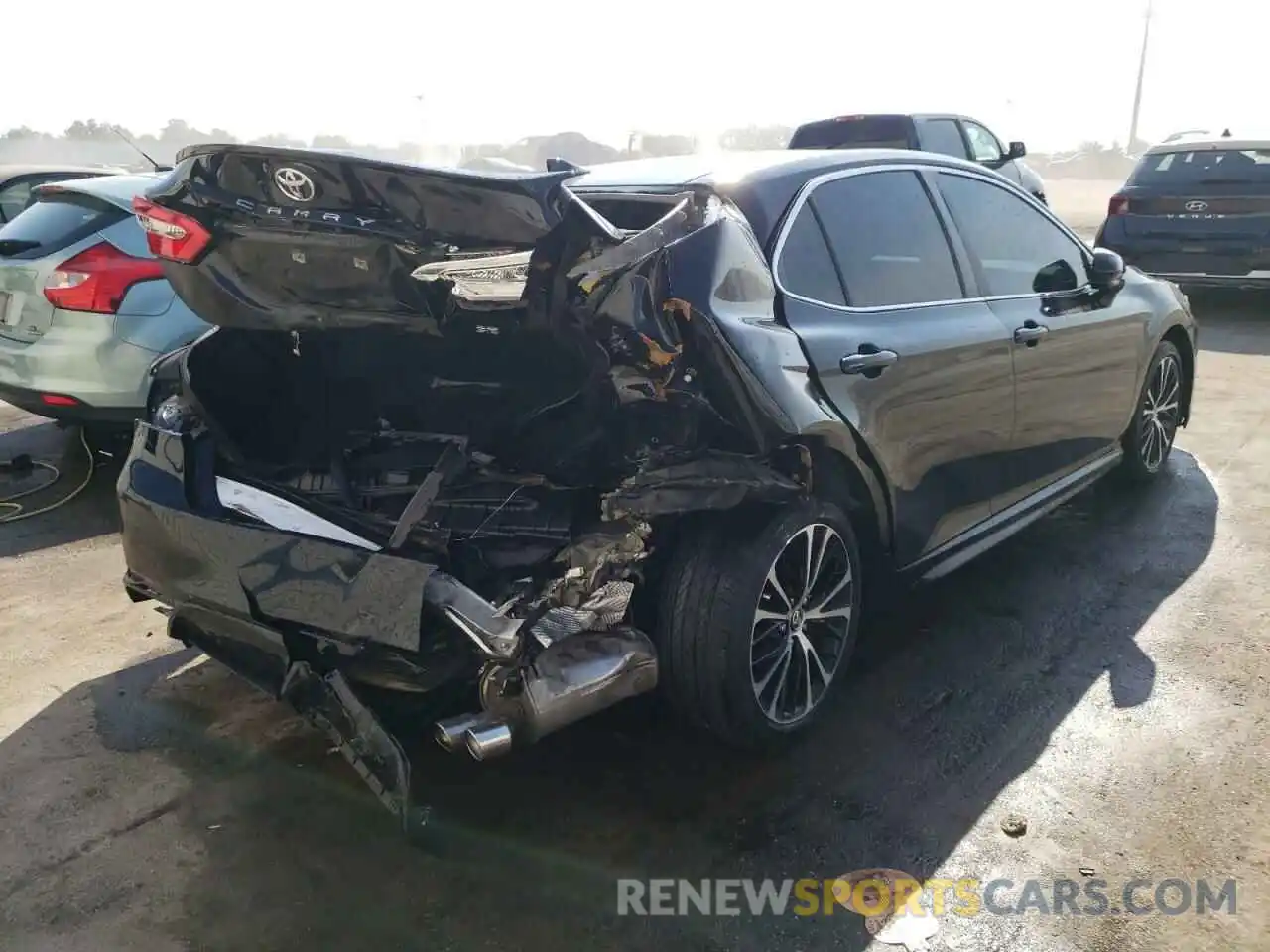 4 Photograph of a damaged car 4T1G11AK3LU324358 TOYOTA CAMRY 2020