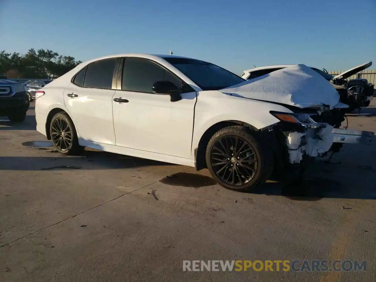 4 Photograph of a damaged car 4T1G11AK3LU370093 TOYOTA CAMRY 2020