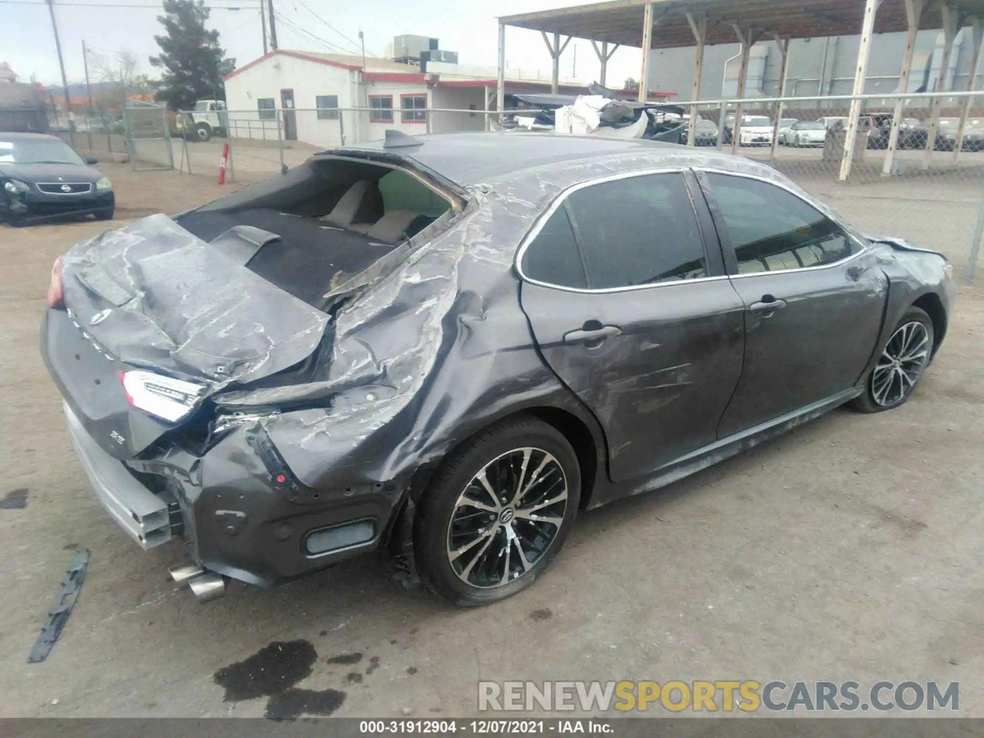 4 Photograph of a damaged car 4T1G11AK3LU884140 TOYOTA CAMRY 2020