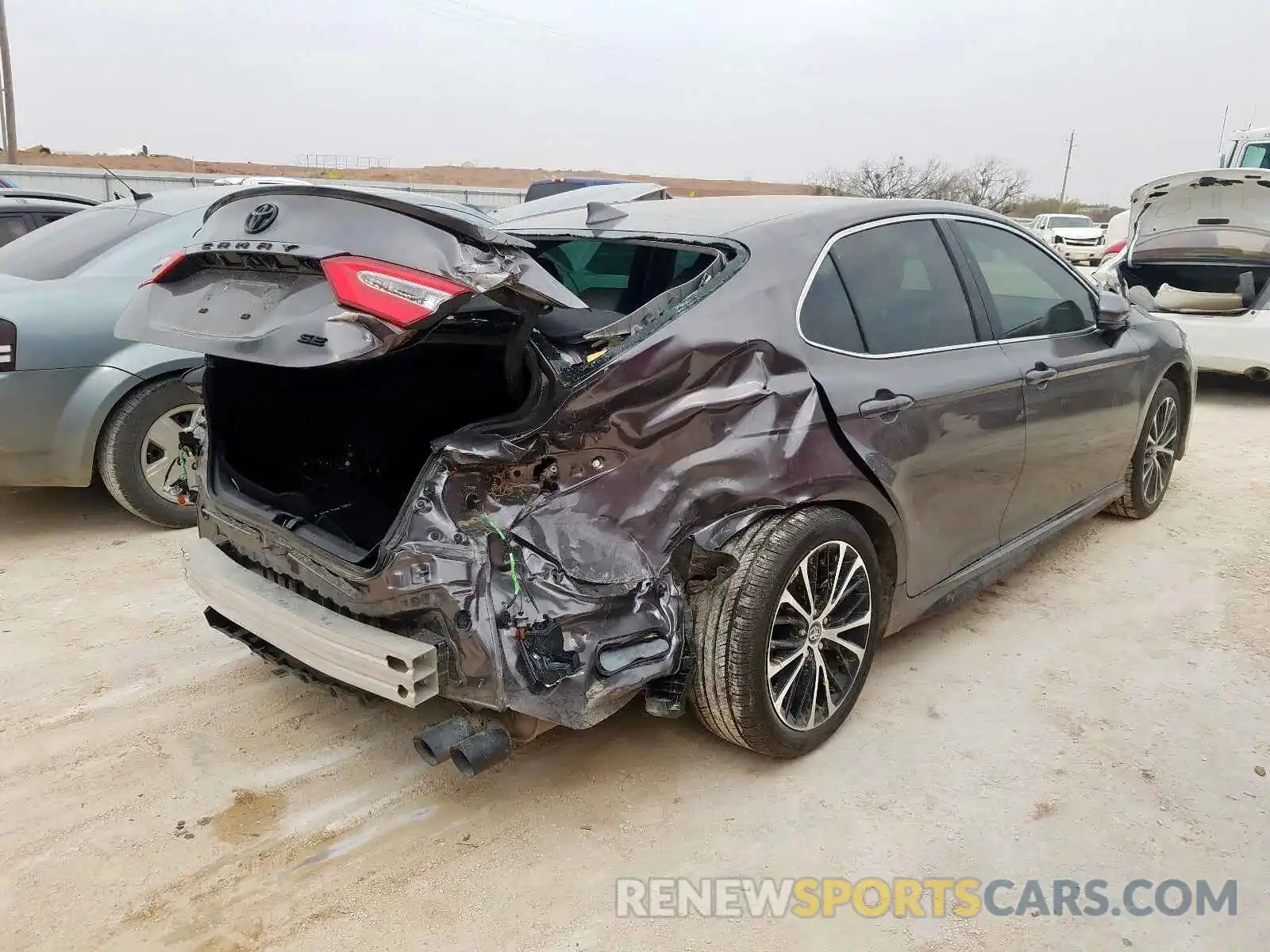 4 Photograph of a damaged car 4T1G11AK3LU889533 TOYOTA CAMRY 2020