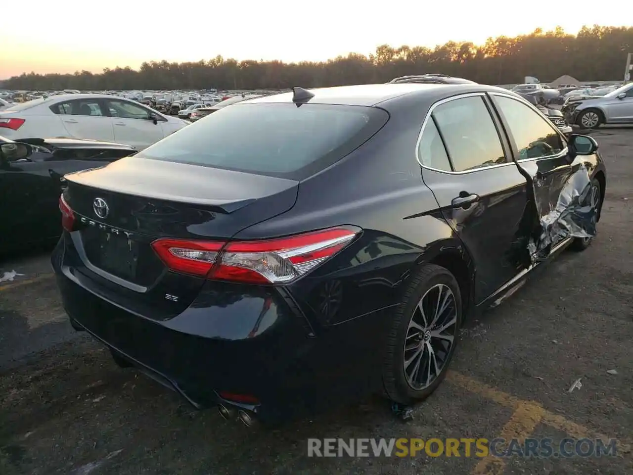 4 Photograph of a damaged car 4T1G11AK3LU923941 TOYOTA CAMRY 2020