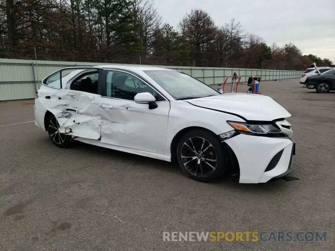 4 Photograph of a damaged car 4T1G11AK3LU929738 TOYOTA CAMRY 2020