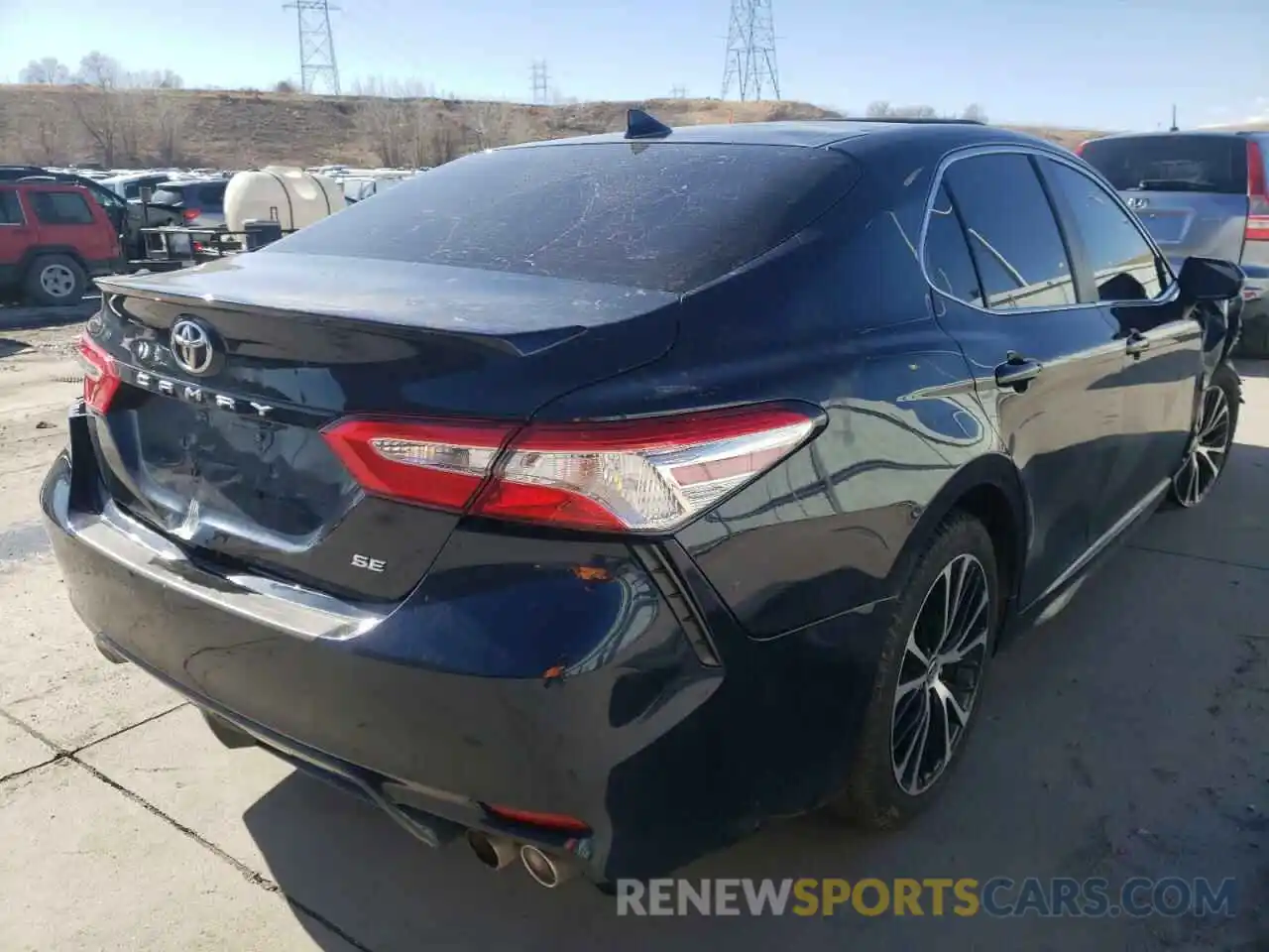 4 Photograph of a damaged car 4T1G11AK3LU963923 TOYOTA CAMRY 2020