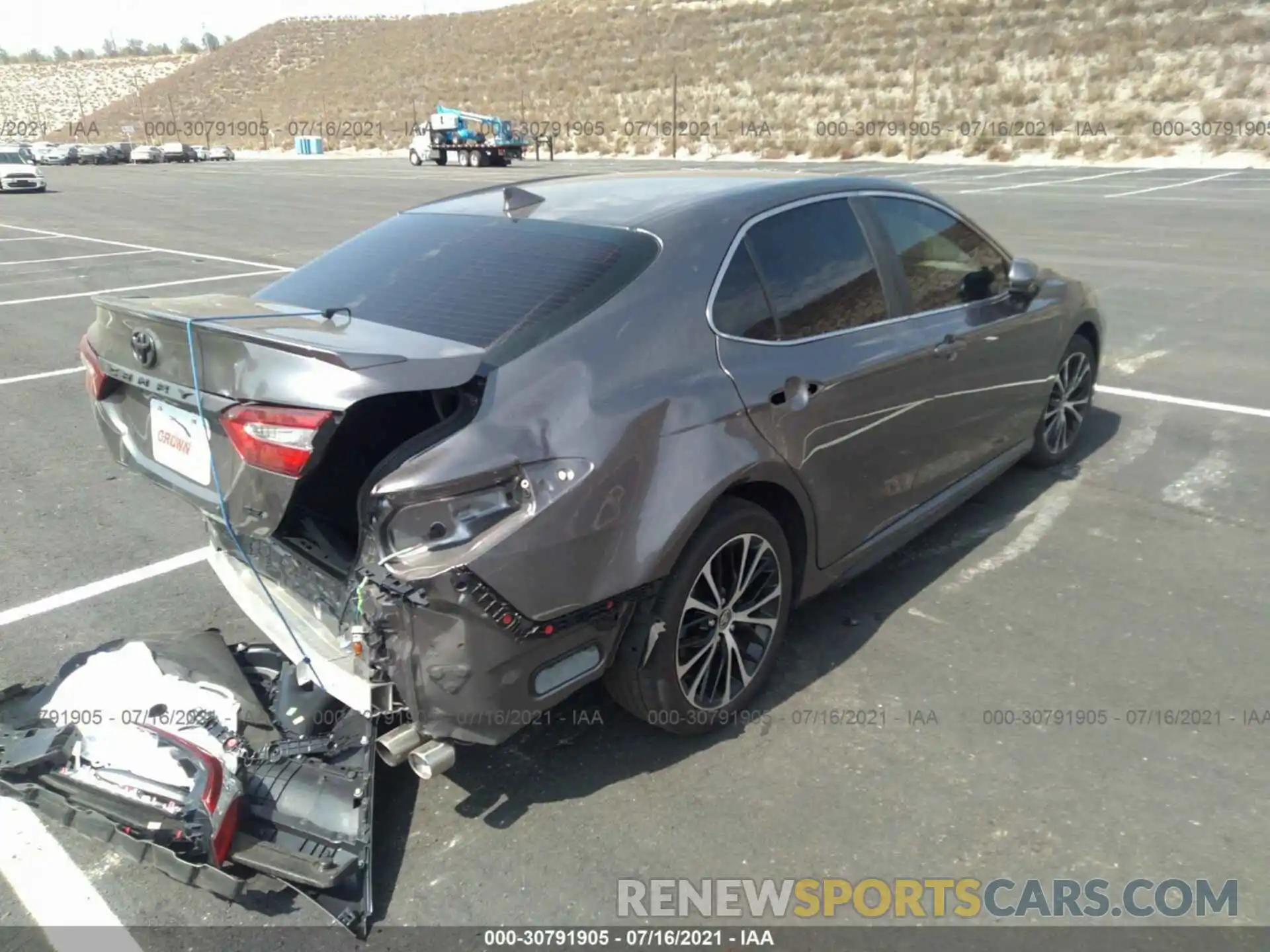 4 Photograph of a damaged car 4T1G11AK3LU987042 TOYOTA CAMRY 2020