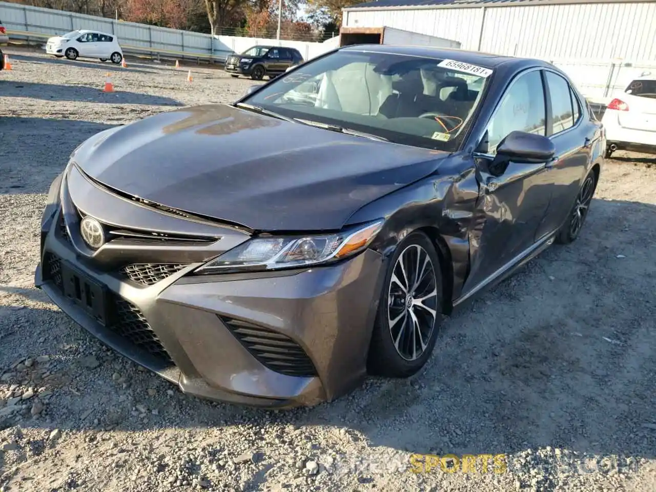 2 Photograph of a damaged car 4T1G11AK4LU977653 TOYOTA CAMRY 2020