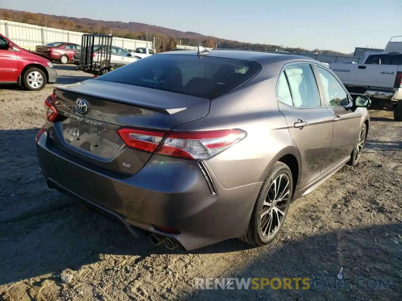 4 Photograph of a damaged car 4T1G11AK4LU977653 TOYOTA CAMRY 2020