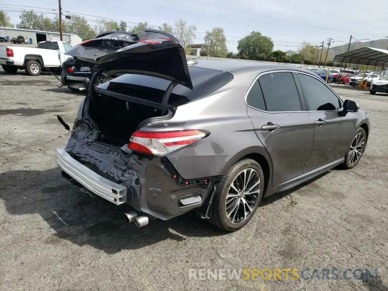 4 Photograph of a damaged car 4T1G11AK4LU980374 TOYOTA CAMRY 2020